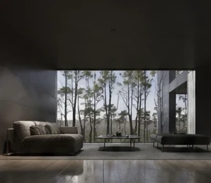 A shaded interior opening toward a woodland garden.